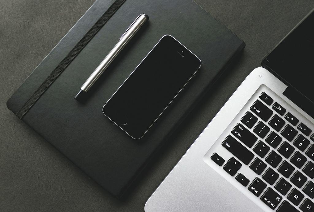 Group of diverse learners studying computer technology together